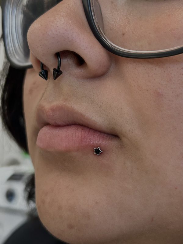 Lip piercing at Apollo — Apollo Tattoo & Piercing Studio 7