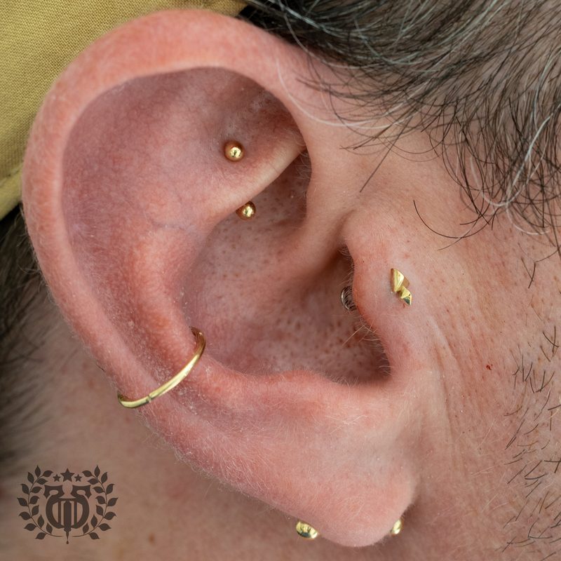 Rook Piercing at Apollo Tattoo & Piercing Studio — Apollo Tattoo & Piercing Studio 6
