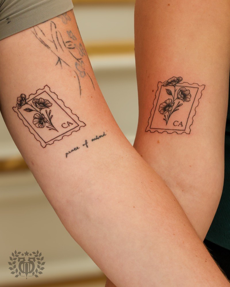 American Traditional color tattoo — swallow with red and green saturation
