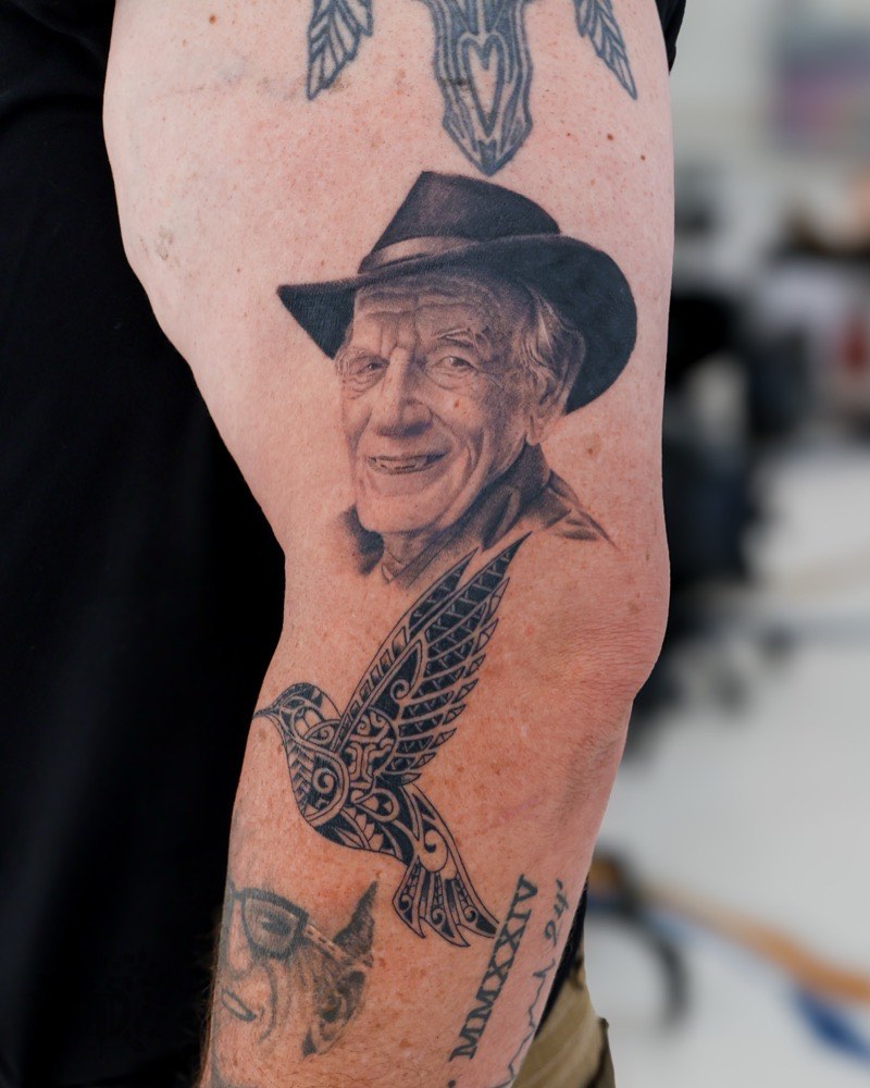 Japanese traditional dragon tattoo — ryu coiling through wind bars and clouds