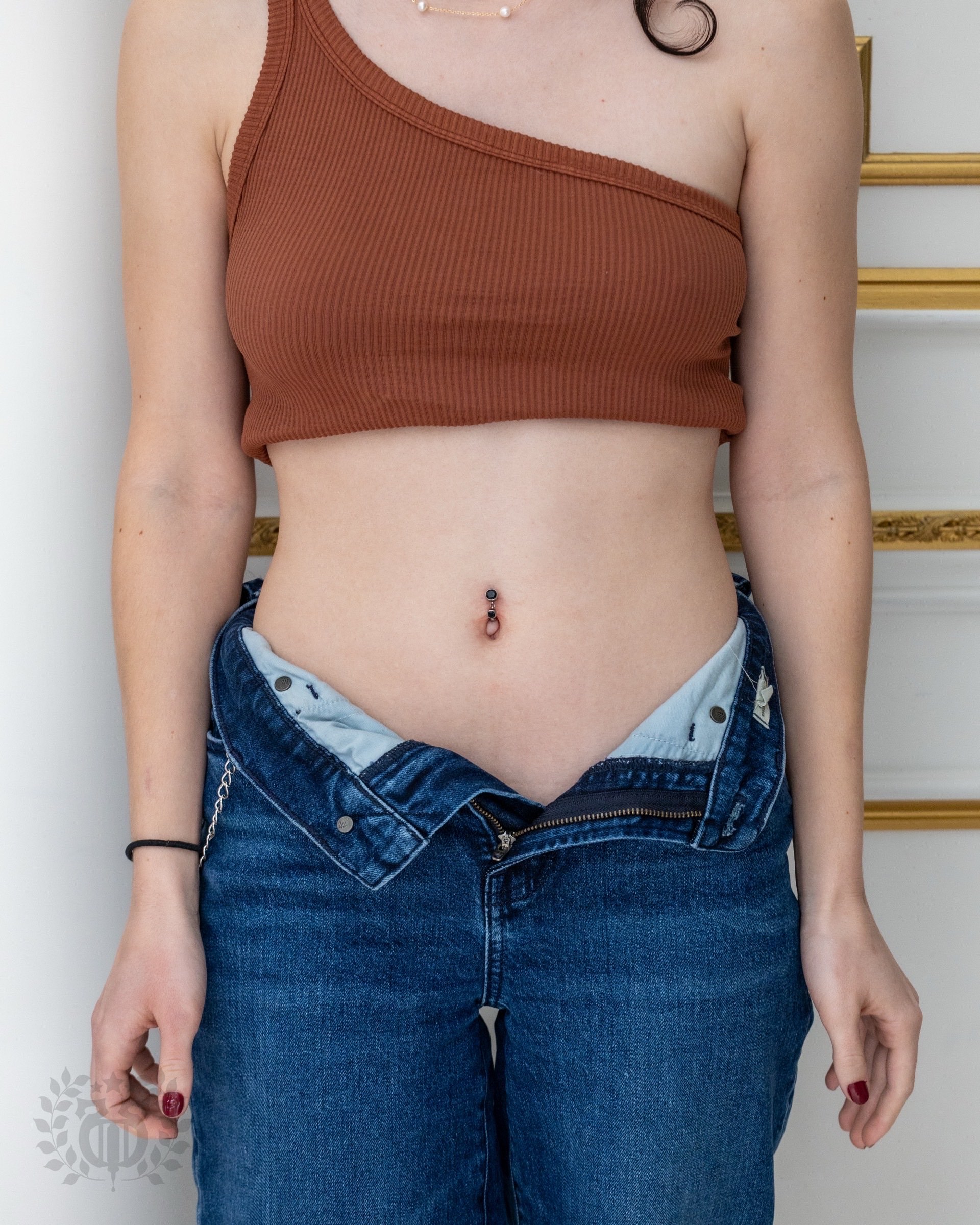 Satisfied client after smiley piercing at Apollo Tattoo and Piercing Studio