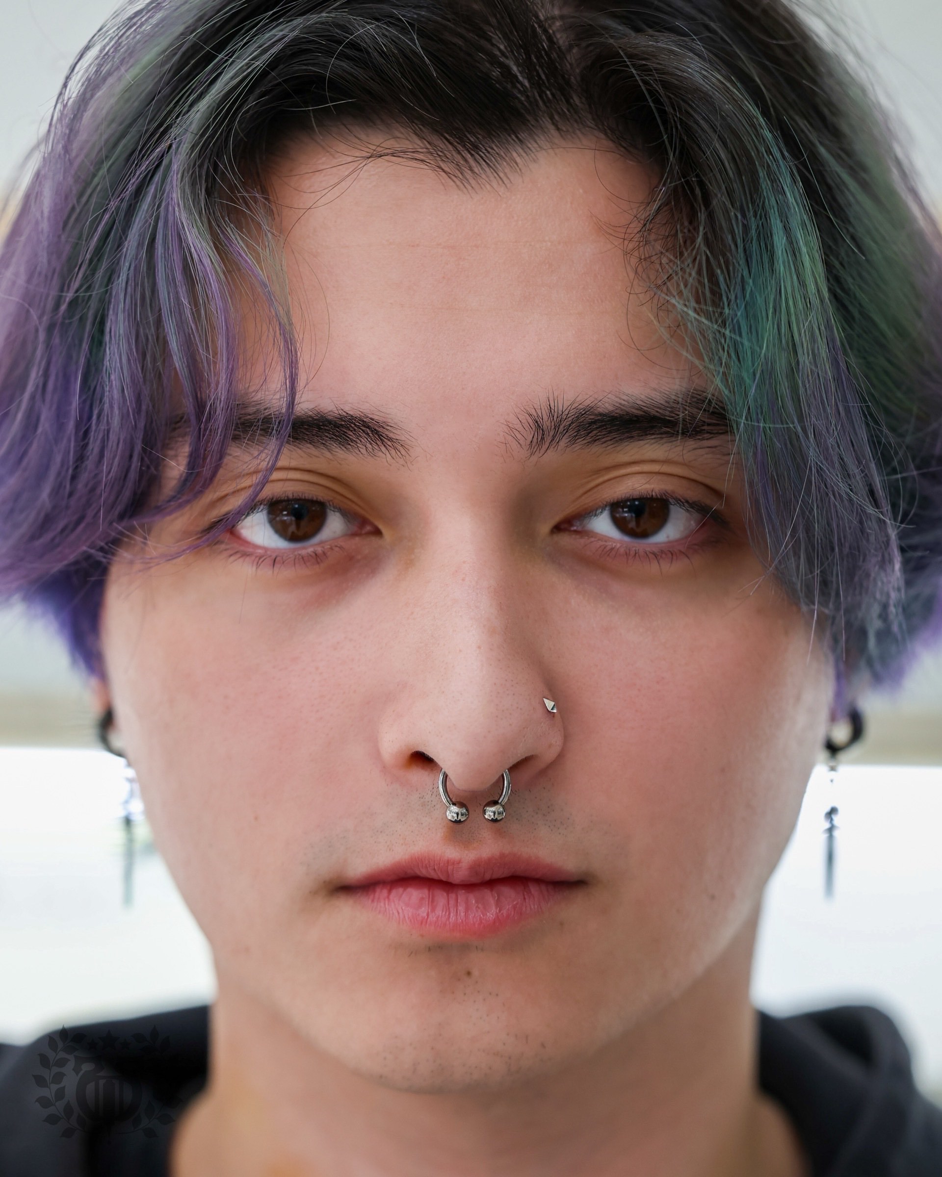 Close-up of tongue piercing with premium implant-grade jewelry