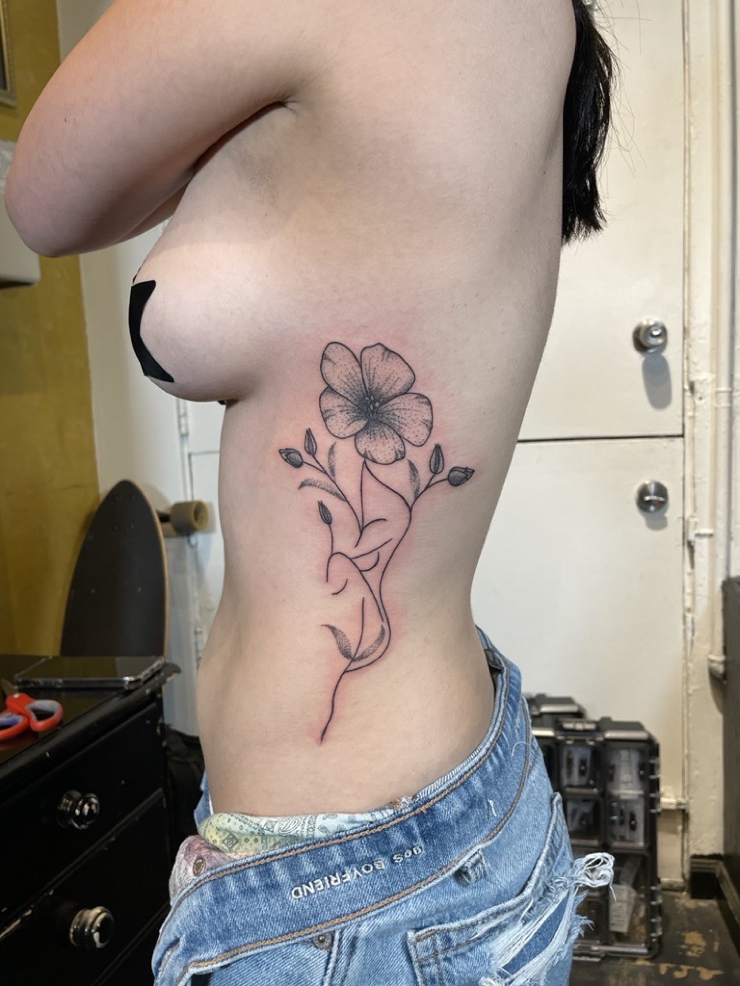 Feminine floral tattoo at Apollo Studio Los Angeles