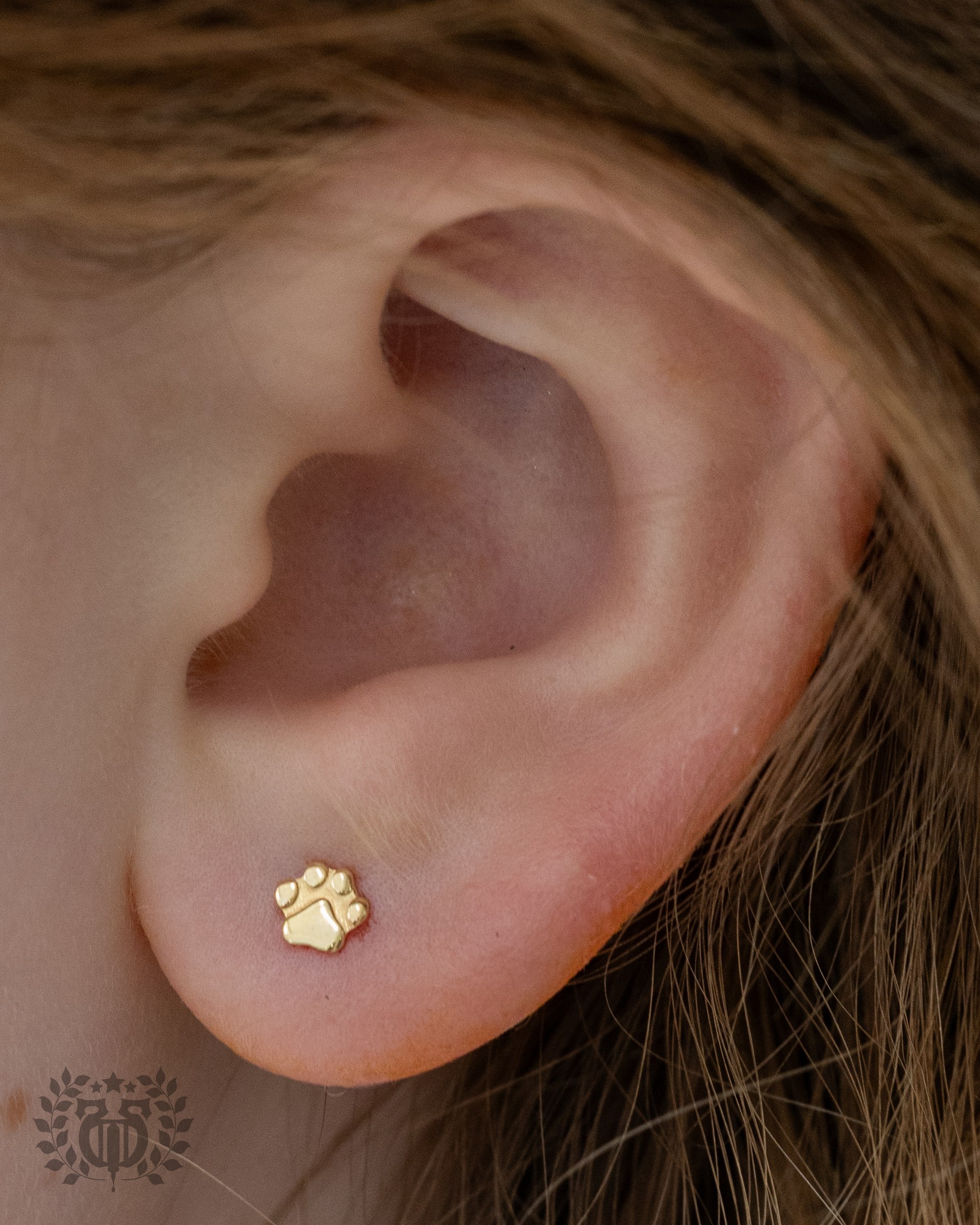 Kids ear piercing at Apollo Studio Los Angeles