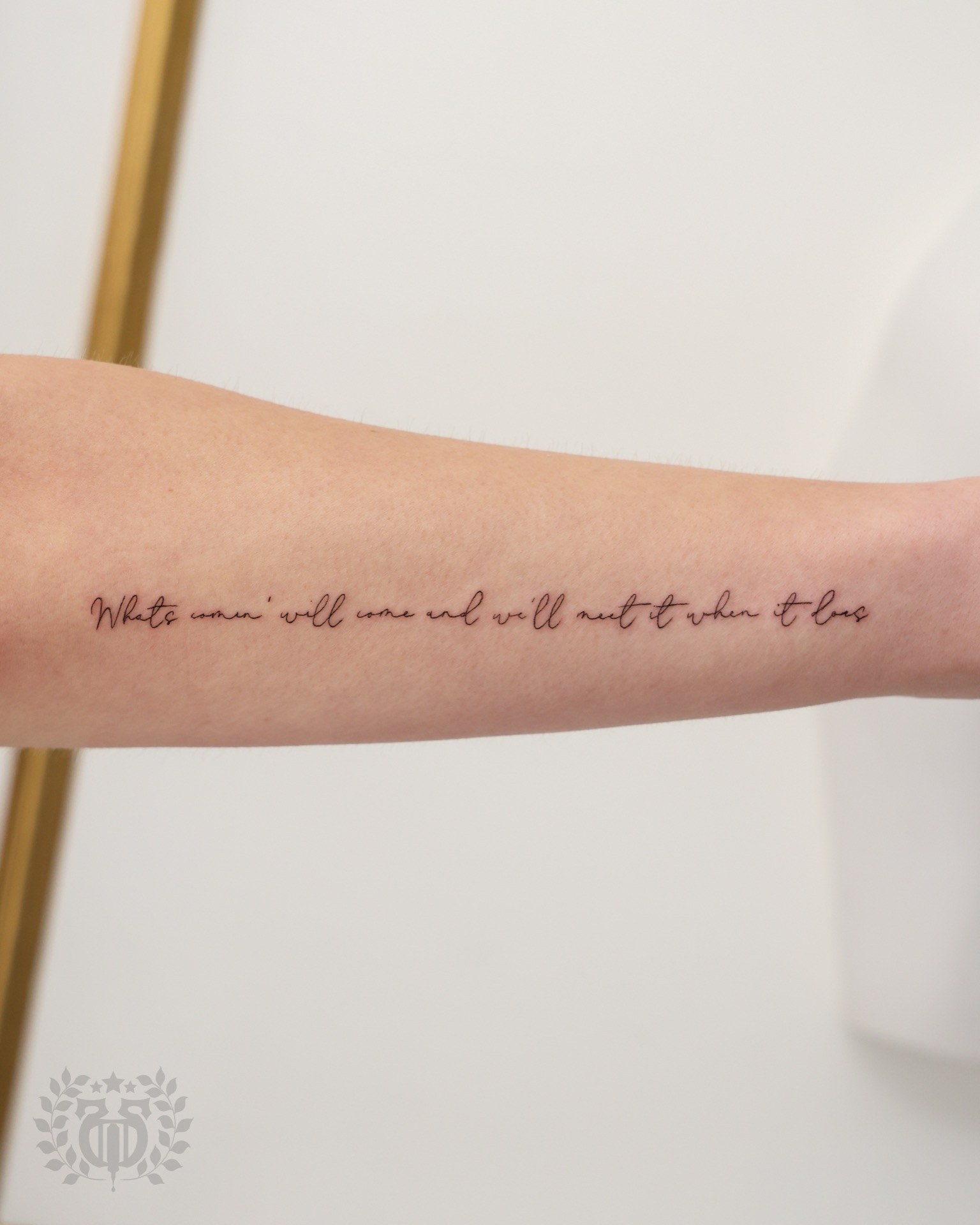 Script lettering tattoo at Apollo Studio Los Angeles