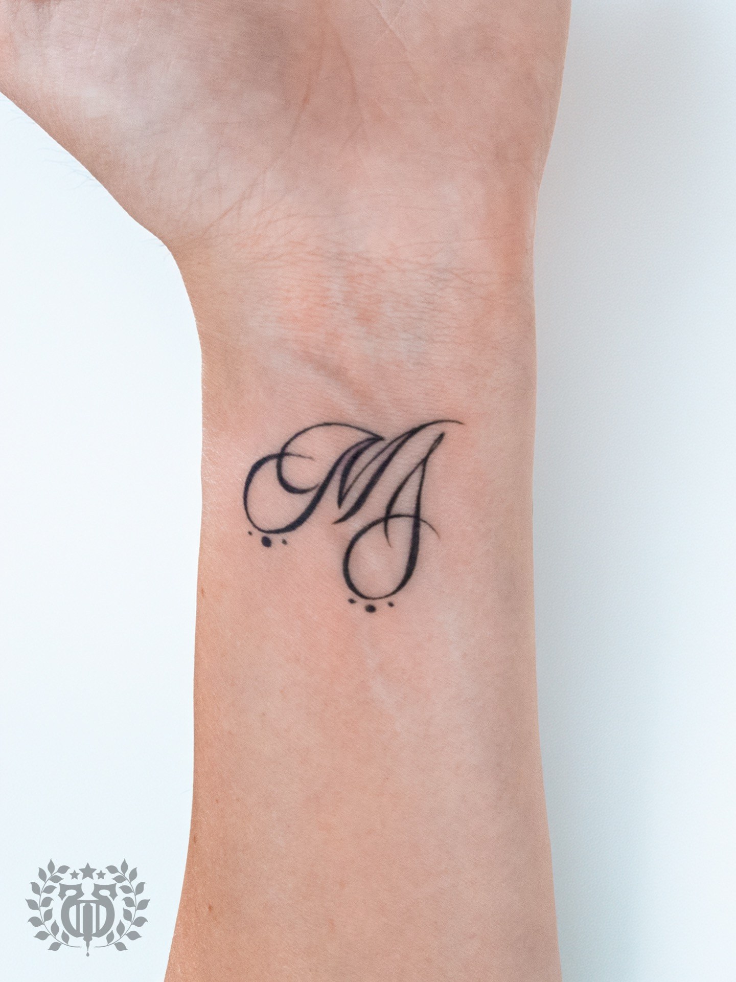 Script lettering tattoo at Apollo Studio Los Angeles