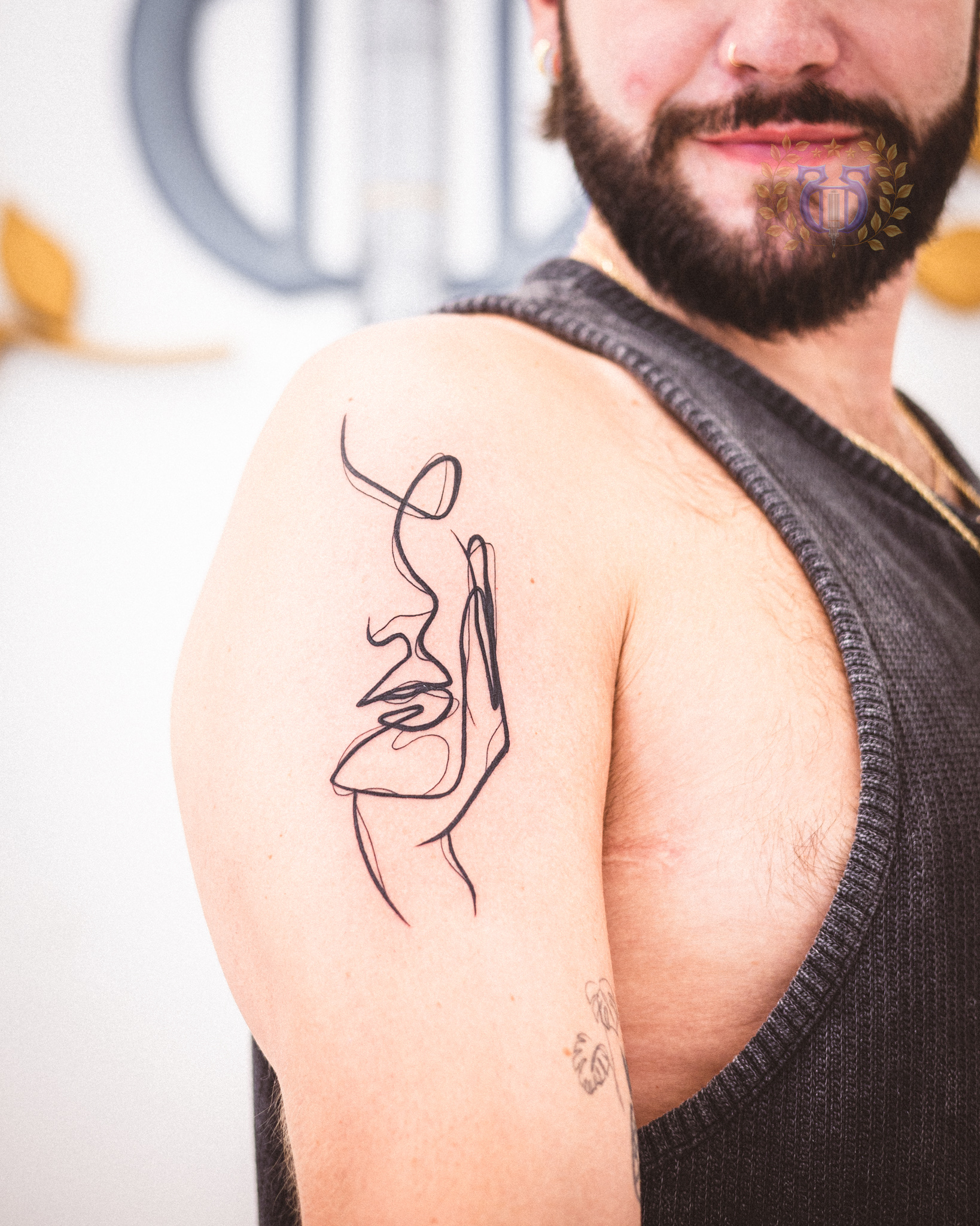 Minimalist single needle tattoo