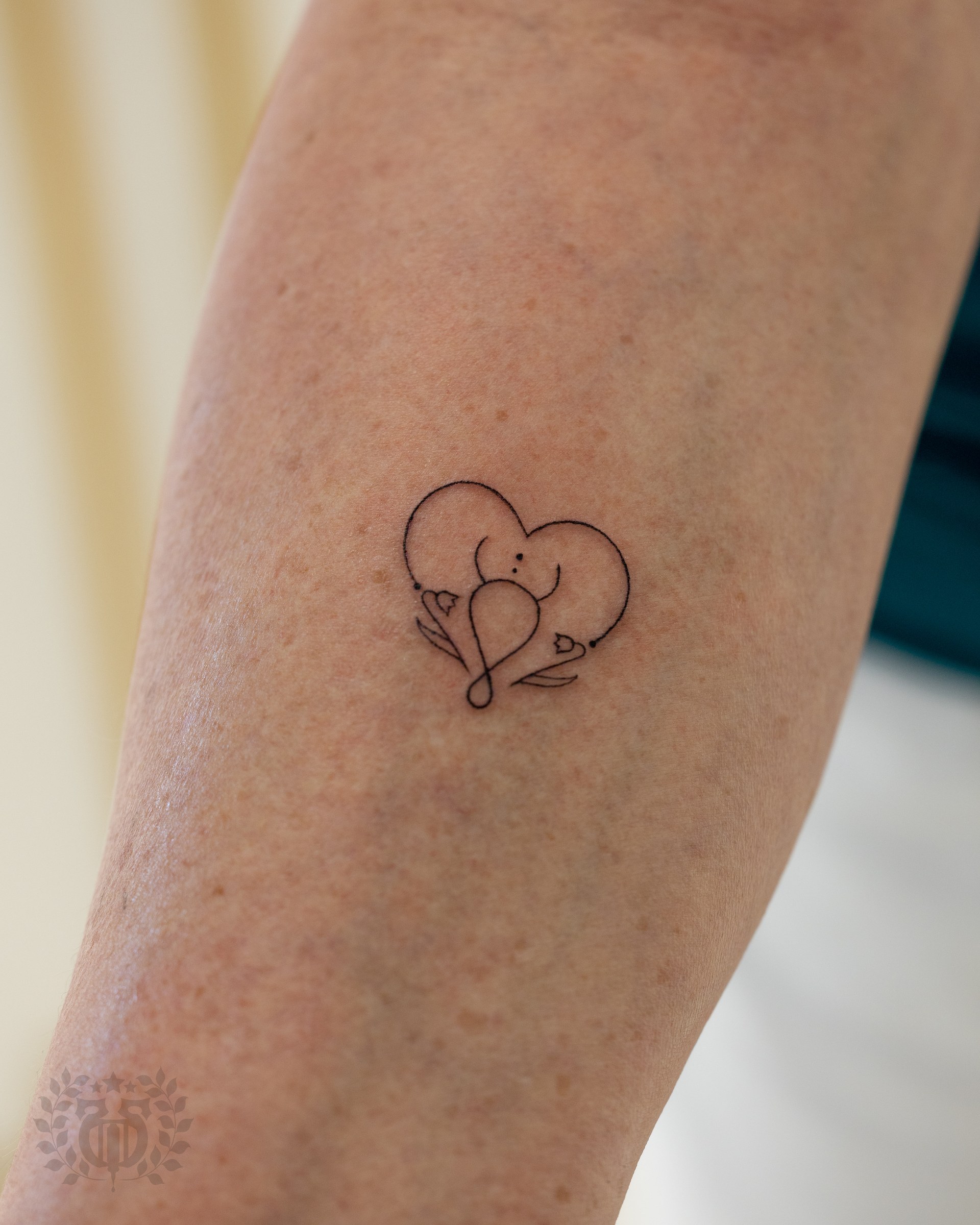 Minimalist fine-line tattoo at Apollo Studio Los Angeles