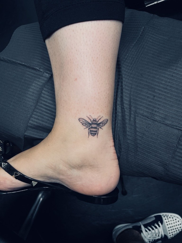 Minimalist fine-line tattoo at Apollo Studio Los Angeles