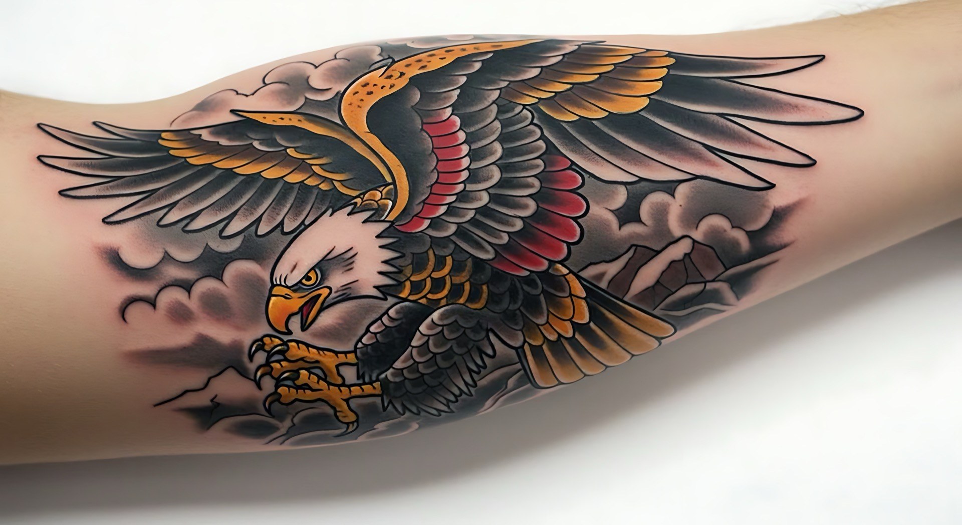 American traditional flying eagle tattoo with clouds at Apollo Studio Los Angeles